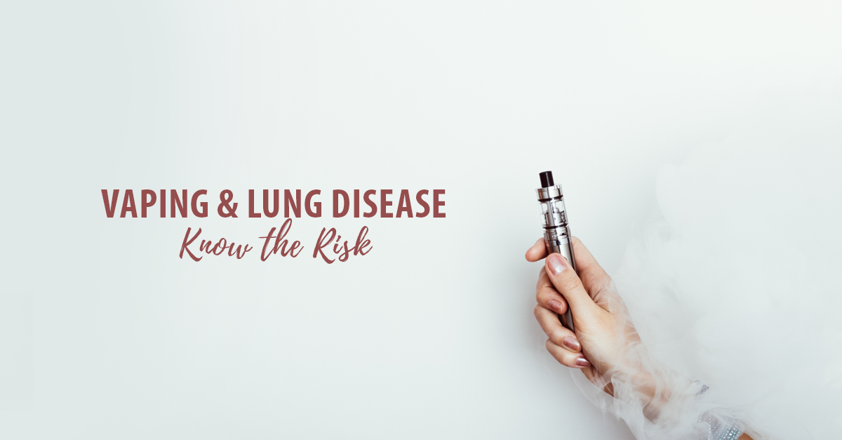 vaping risks blog hand holding up e-cigarette